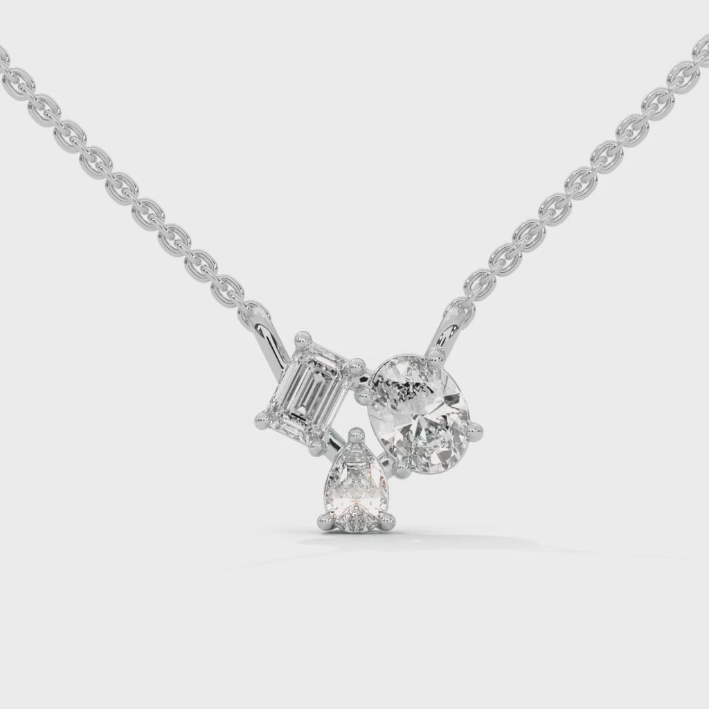 Heavenly Cascade: 14K Gold Three-Stone Diamond Pendant Necklace | 0.38 CTW