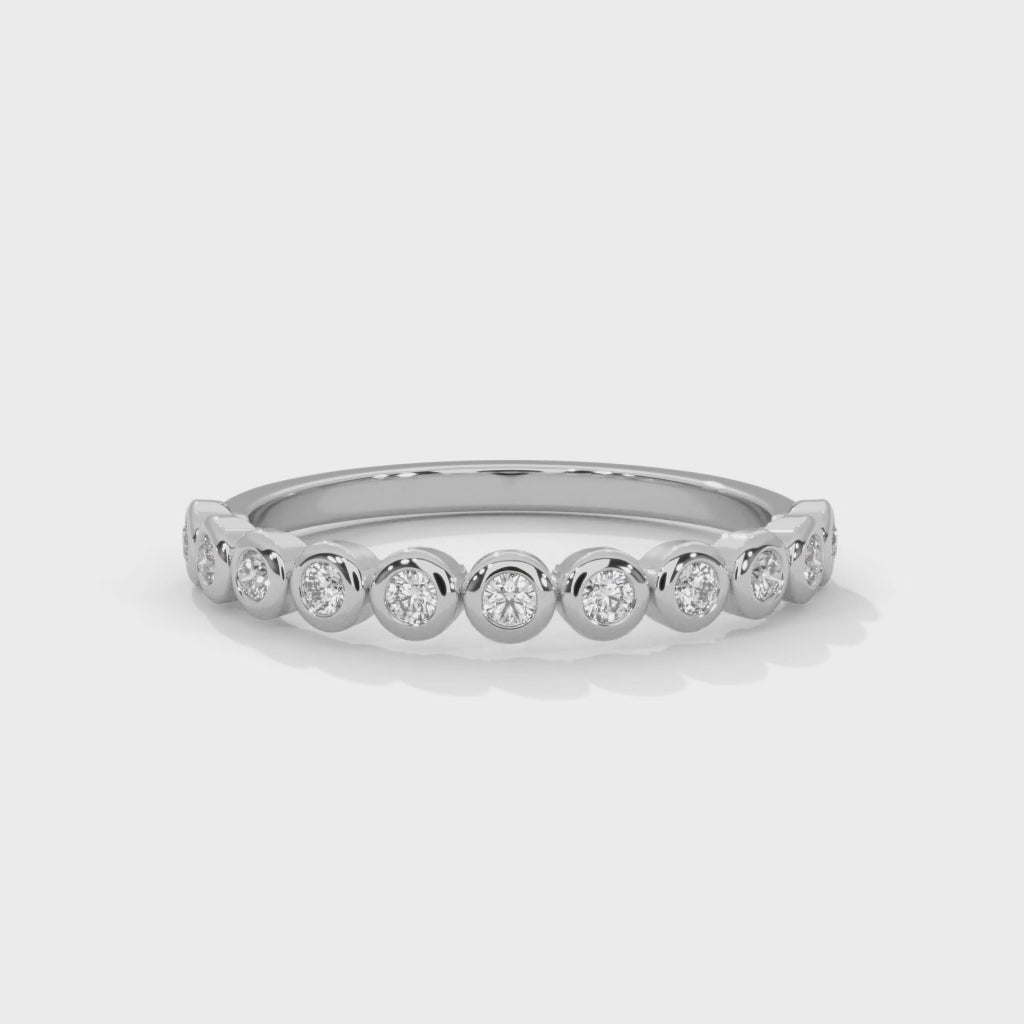 Circular Elegance:  Round Diamond Bezel Set Gold Band | 0.23 CTW